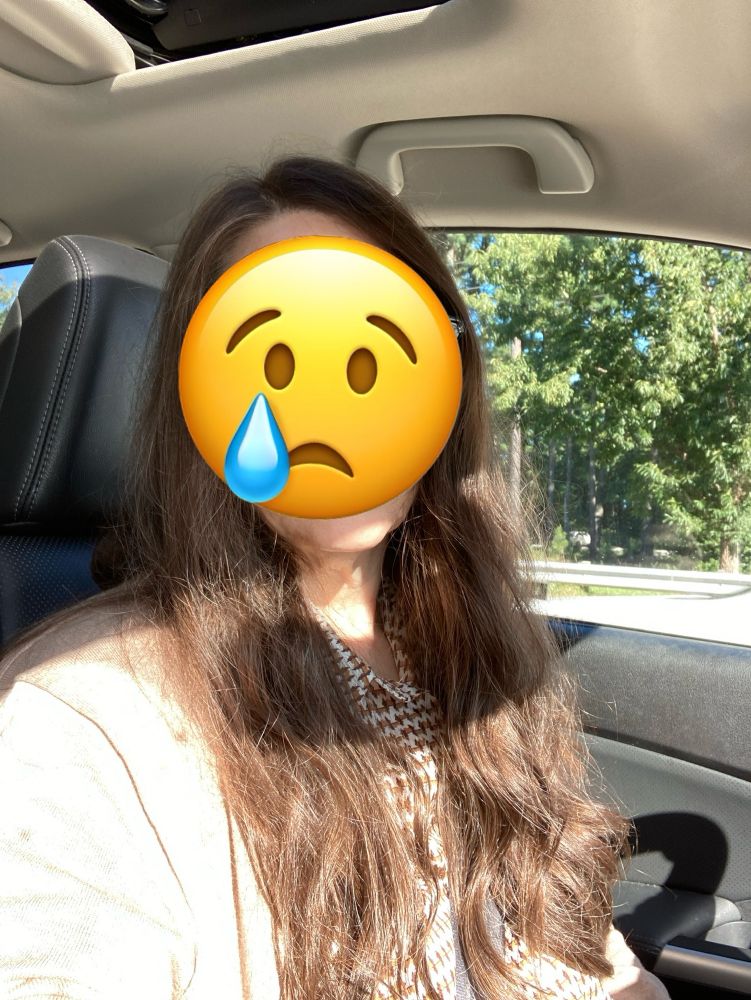 Woman with long, thin, brown hair 