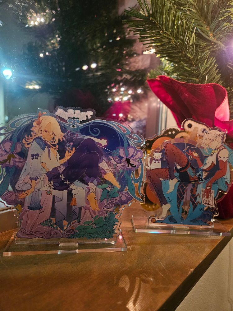 Beautiful Kaveh and Alhaitham acrylic stands from @velkia.bsky.social