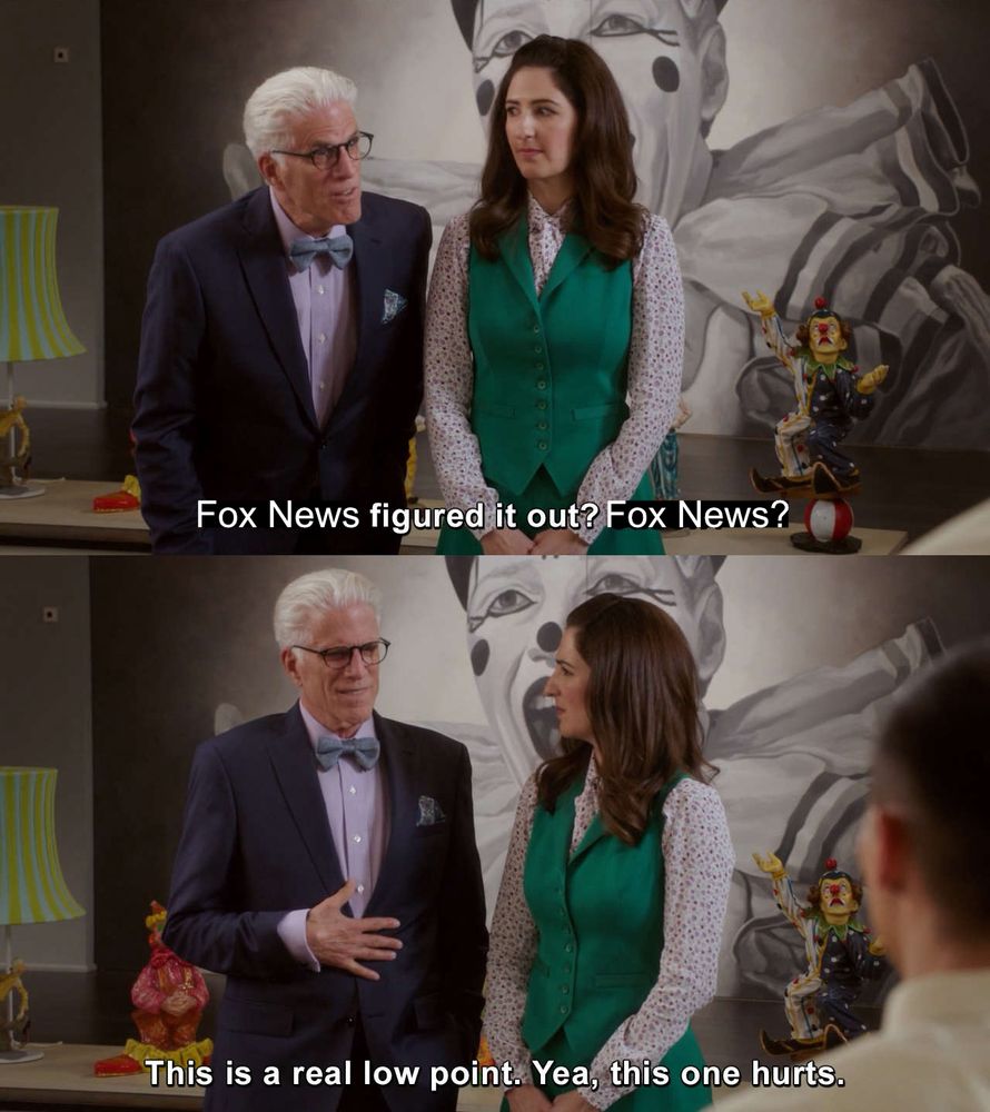 Two stills of a scene from the good place season 2 where one character (michael) is shocked then dismayed, and the other character (Janet) is looking at him. the caption has been edited to read "Fox News figured it out? Fox News? This is a real low point. Yea[sic], this one hurts."
