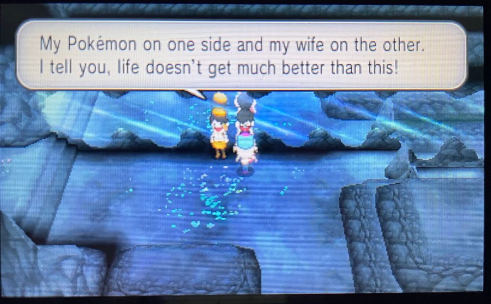 tourist: "my pokemon on one side and my wife on the other. i tell you, life doesn't get much better than this"