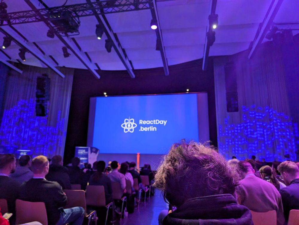 Photo of screen with ReactDay.berlin text