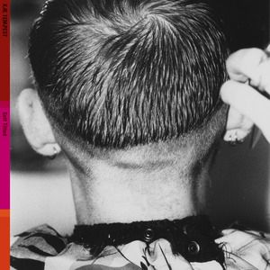 The cover of Kae Tempest’s album Self Titled, showing a black and white image of the back of someone’s (probably Kae) head, with short buzz cut hair. Also you should listen to this album. 