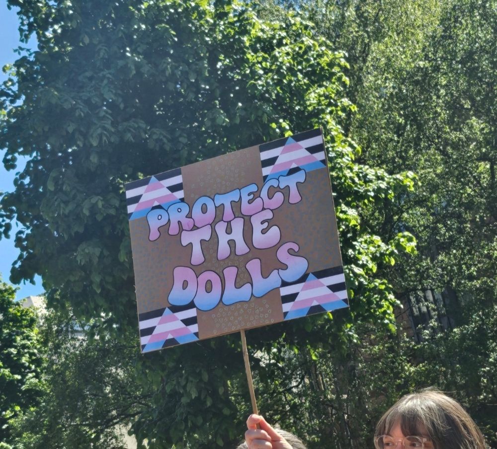 Protect the dolls sign 