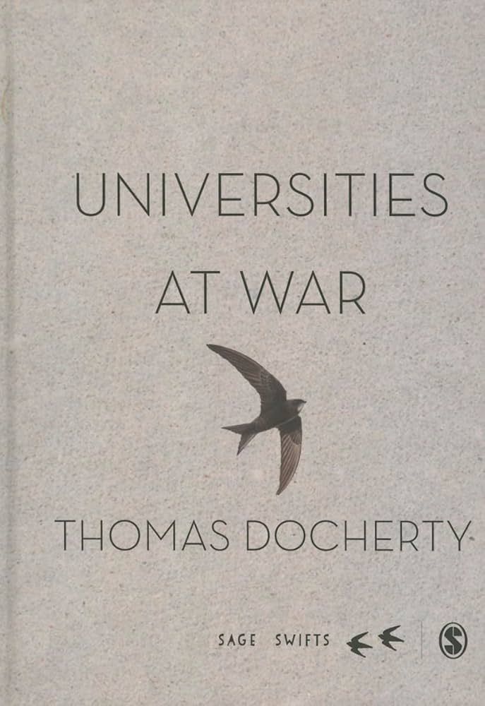 Book cover of Universities at War by Thomas Docherty.