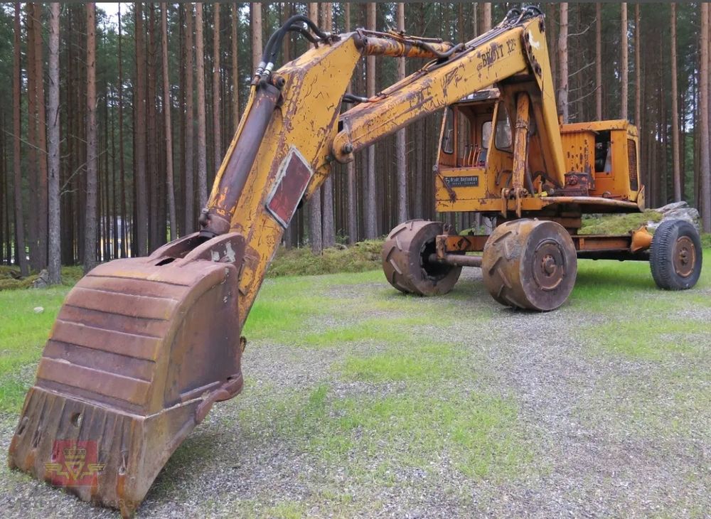 Gul og gild Brøyt-gravemaskin