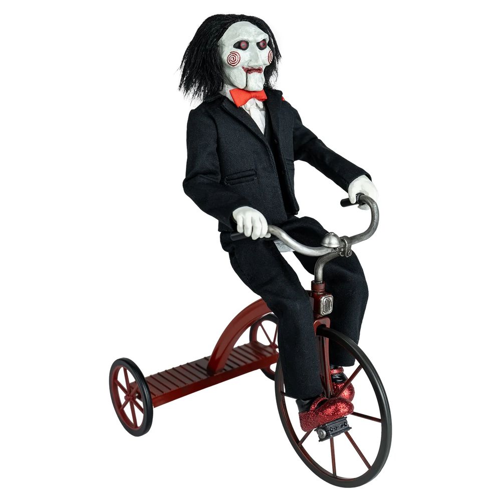 Jigsaw, possibly also Harvey here, riding the tricycle