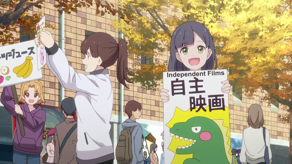 Food for the Soul screencap with a cute girl holding up a sign that says "Independent Films" while an adorable Godzilla illustration is on it