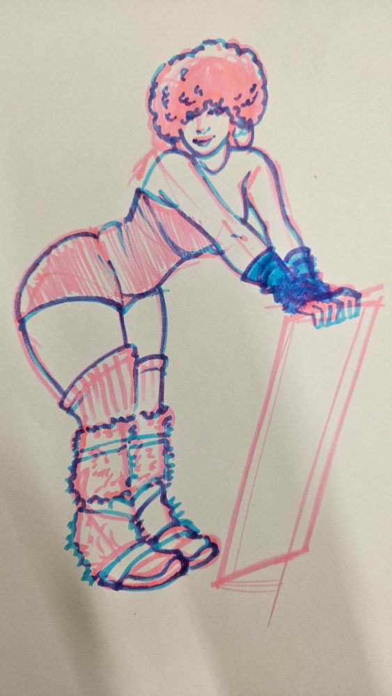 A woman with an afro and furry boots leaning over