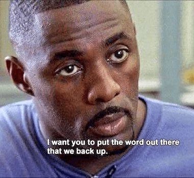 Idris Elba as Stringer Bell in The Wire with the caption "I want you to out the word out there that we back up" 