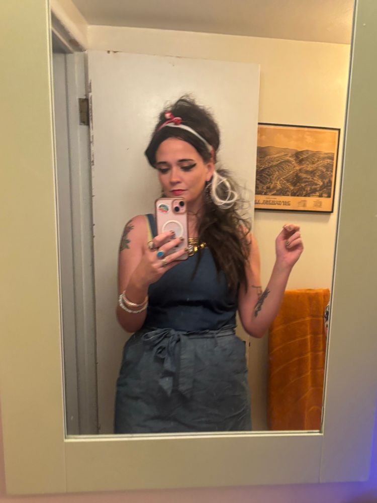 Biped woman dressed up like Amy winehouse 