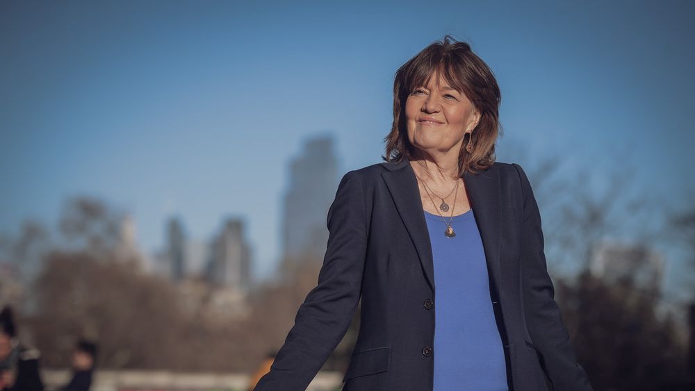 Jane Corbin smiles warmly on a sunny day.