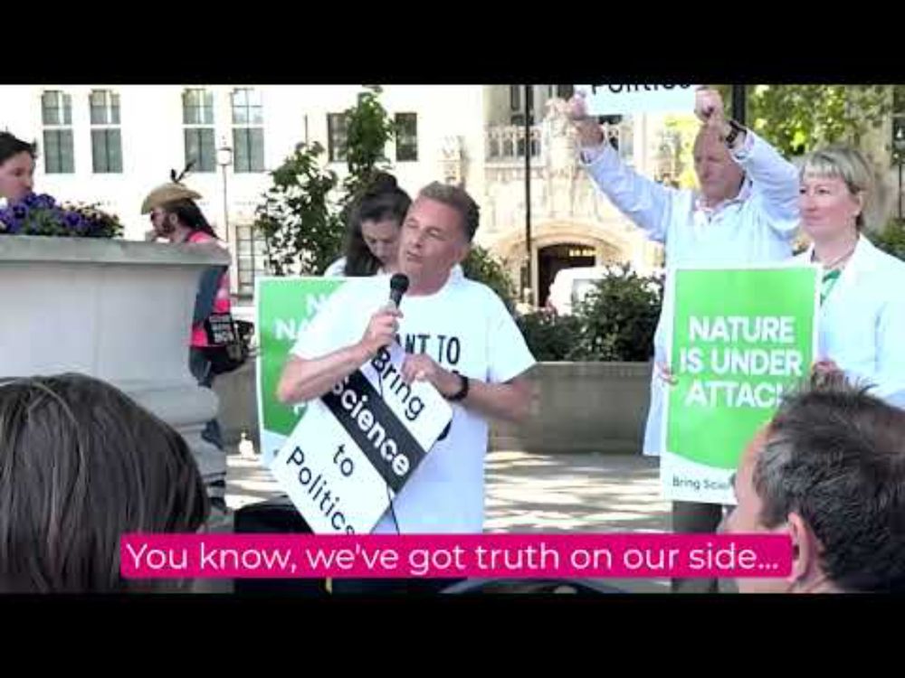 Scientists speaking outside Parliament