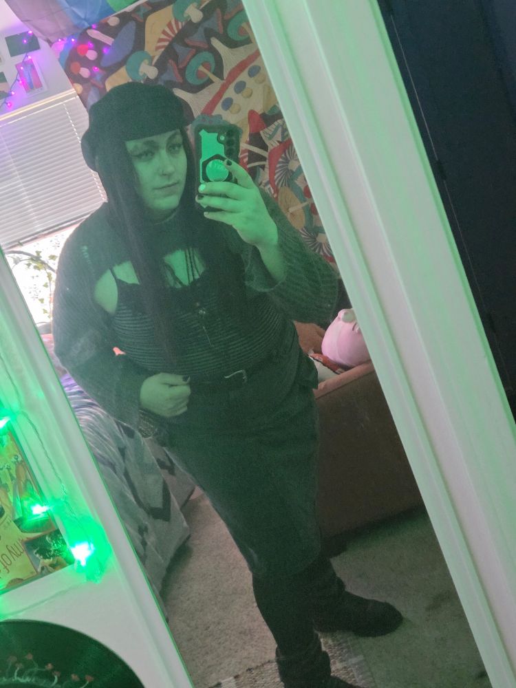 A second one in green shes leaned forward in this photo tho 