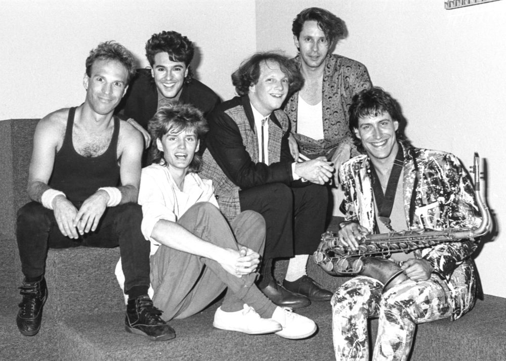 Charlie Peacock and band at Wolfgang's in SF, circa 1985. L-R: Kurt Wortman, drums; Geno Lopes, bass; Mike Miller, guitar; CP; Bongo Bob Smith, perc; and the late Ben Bossi on tenor sax.