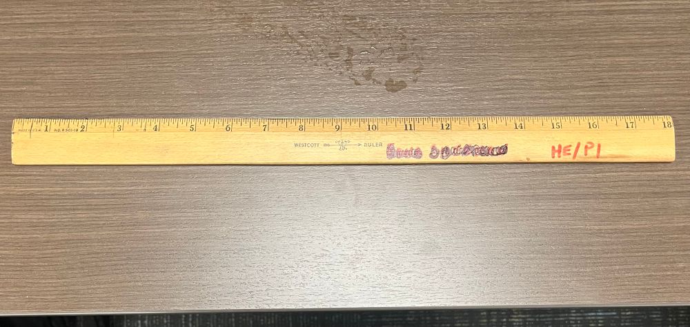 A wooden, 18” ruler.