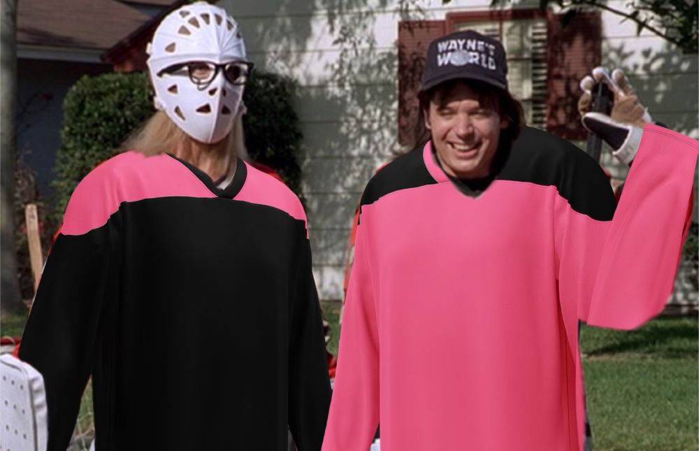 Garth and Wayne playing street hockey, but now they’re wearing USS Bimbo hockey jerseys. Garth with his goalie mask and gloves wears one in the Deep Space style (pink on yokr, black on bottom) and Wayne, waving a hand and smiling, is wearing a Generation pink style (black on yoke, pink on bottom).