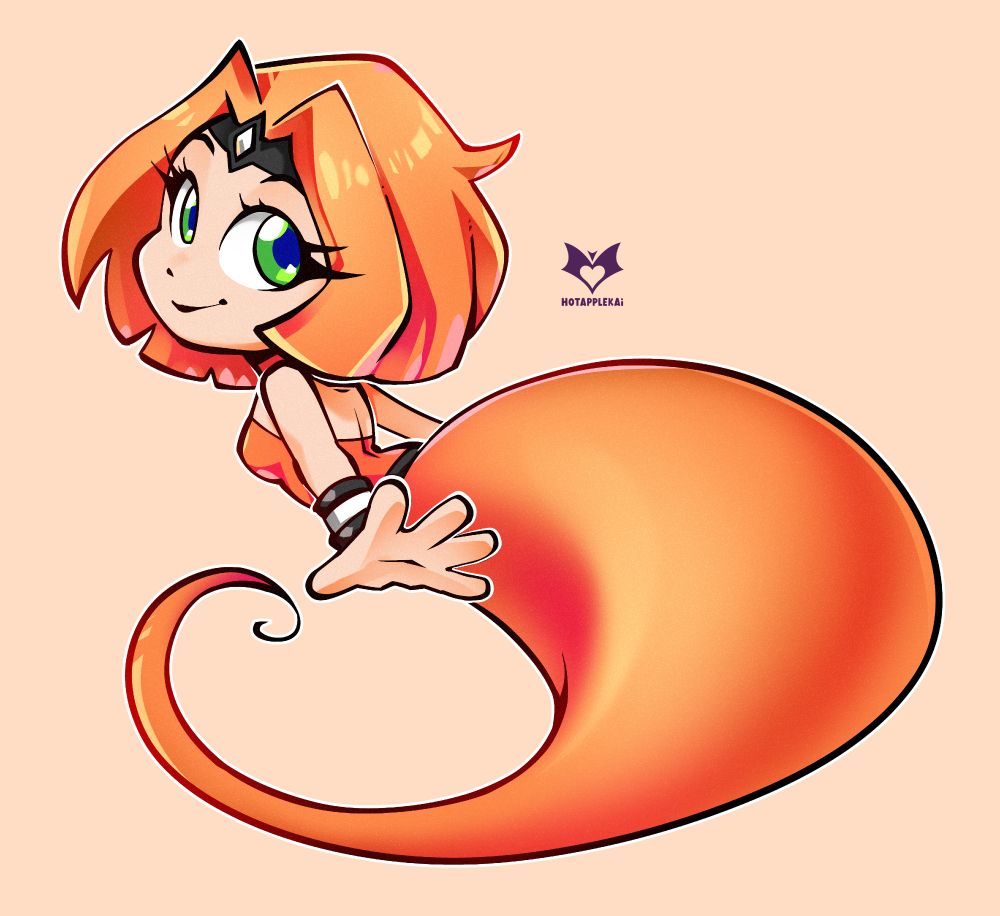 An orange black and white genie looking back at the camera