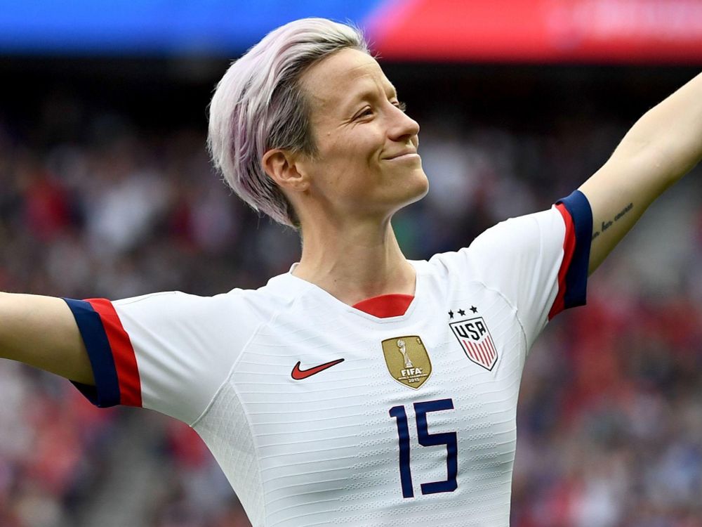 Megan Rapinoe strikes a hero pose