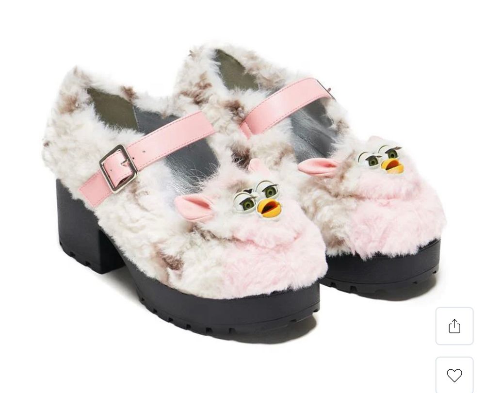 Shoes with Furby faces stuck to them. They are fuzzy. 