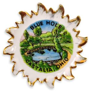 A decorative plate depicting the Blue Hole. 