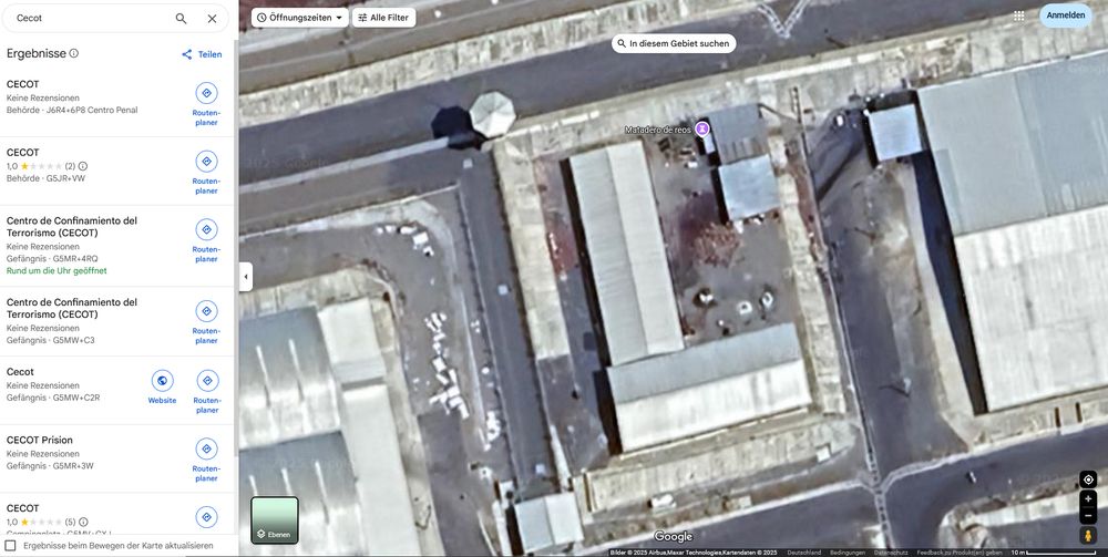 Picture from Google Maps of part of Cecot barracks from above, with a red stained area on the asphalt between them and a nearby building tagged "slaughterhouse for the prisoners"