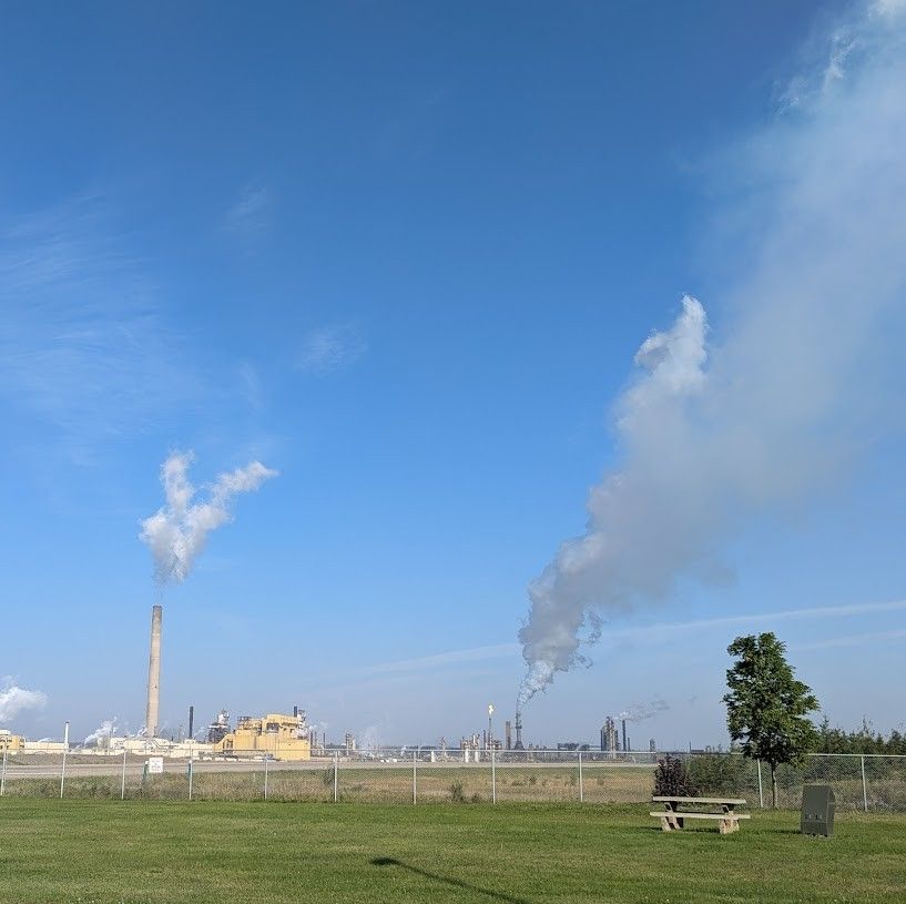 Scene of industry with plumes.