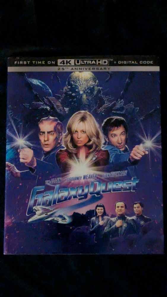 A UHD copy of Galaxy Quest starring Tim Allen, Sigourney Weaver, and Alan Rickman.