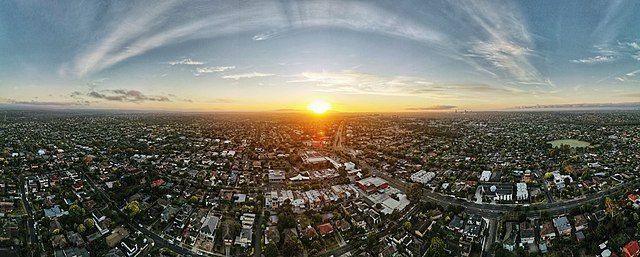Colour photo of a sunrise over a city. This image is on Wikimedia Commons, with the following title: "640px-Templestowe_sunrise". If you have taken the time to access this text, may today be nothing but kind to you and yours.