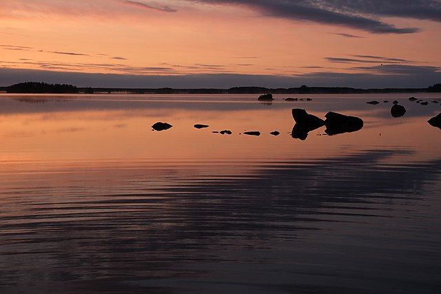 Colour photo of a beach at sunrise. This image is on Wikimedia Commons, with the following title: "Isojärvi_sunrise_3". If you have taken the time to access this text, may today be nothing but kind to you and yours.