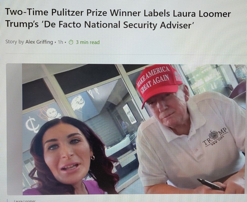Online article headline "Two-Time Pulitzer Prize Winner Labels Laura Loomer Trump's 'De Facto National Security Adviser'  below which is a selfie taken by Loomer, on the left, and Trump to the right, seated, wearing a white polo shirt and red baseball cap. 