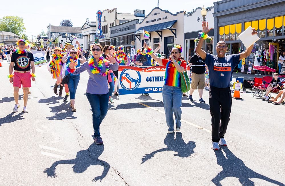 Congresswoman Suzan DelBene, Washington State Representative  April Berg, Washington State Senator John Lovick, and members of the 44th Democrats march the Pride Parade in Snohomish.