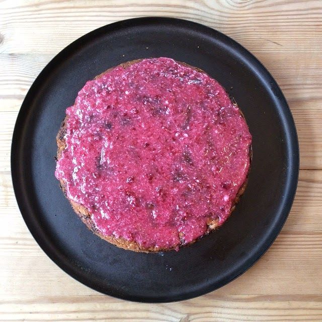 A top down shot of a bright pinked iced cake on a Netherton Foundry baking and serving tray