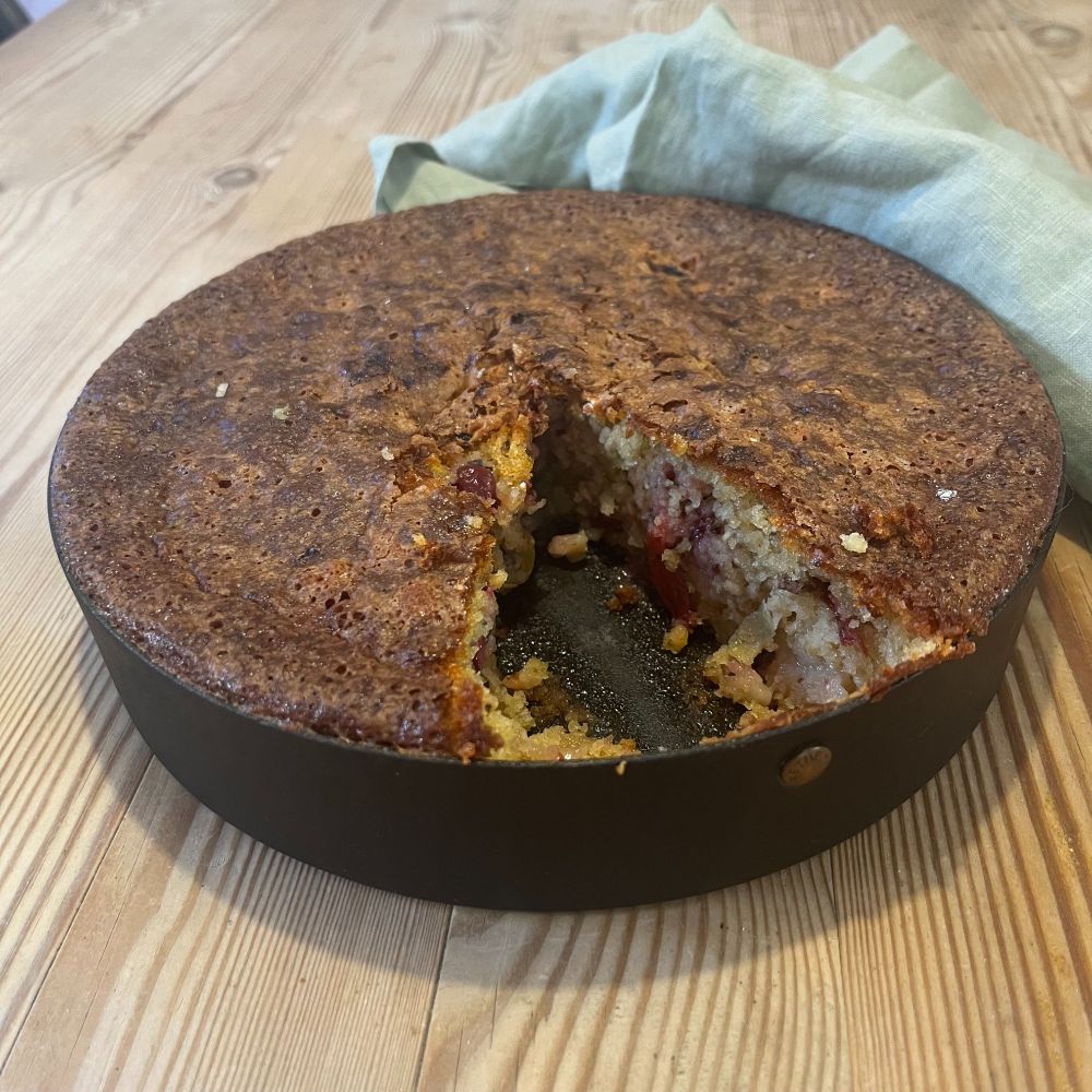 A Netherton Foundry 8½ inch cake tin containing a gooseberry and oat cake, recipe from Mark Diacono's book, Sour