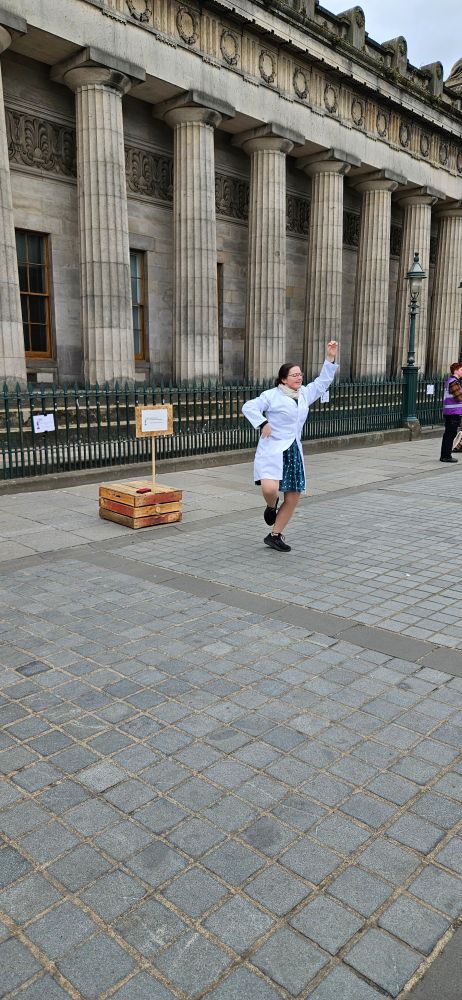 A scientist dances a highland fling