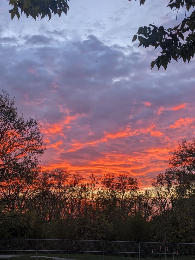 Sunset, under side of clouds turned bright orange 