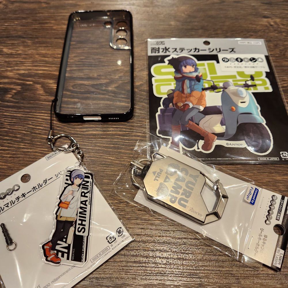 official Yuru Camp merch - an acrylic keychain, sticker, and retractable key holder with Shima Rin ☺️