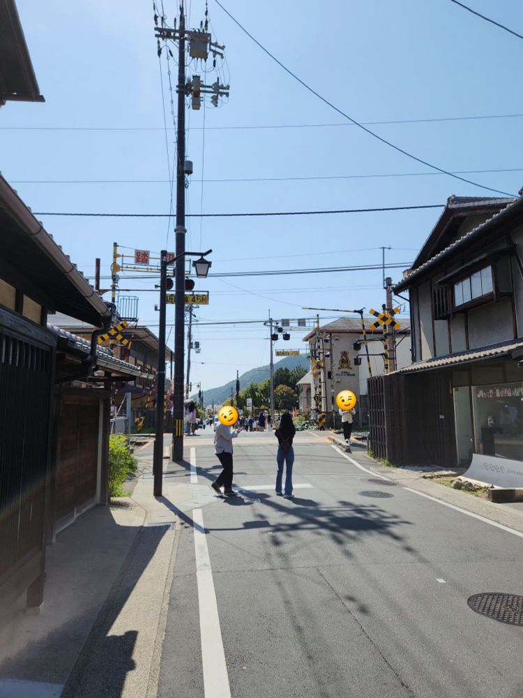 countryside road in Kyoto with a railroad crossing in the middle, "aesthetic Japan"