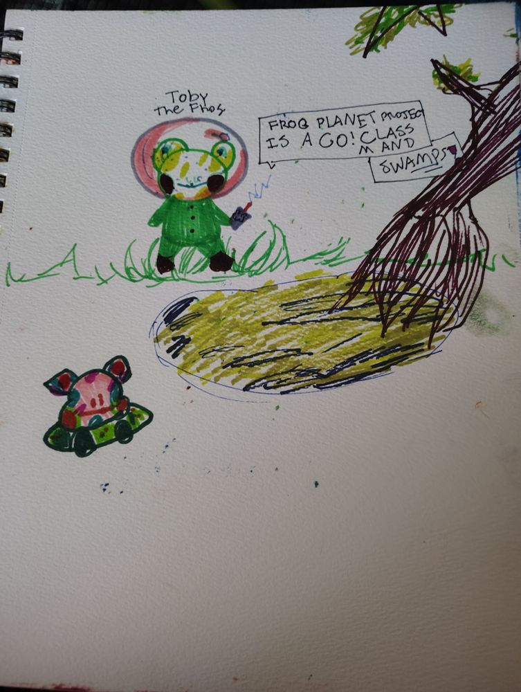 A stylized doodle made with markers: There is an anthropomorphic frog astronaut holding a communicator, which has a dialogue box above it reading "FROG PLANET PROJECT IS A GO! CLASS M AND SWAMPS!" the word "swamp" is underlined for emphasis. The frog stands on long, green grass next to a swampy pond. There is a mangrove tree next to the pond, and an alien frog on the other side of the pond. Note that the alien frog is not anthropomorphic. 