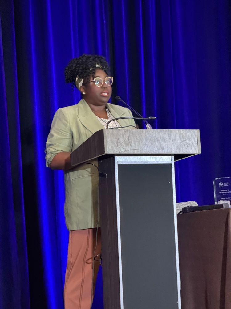 Picture of Adoma Manful presenting the prize presentation