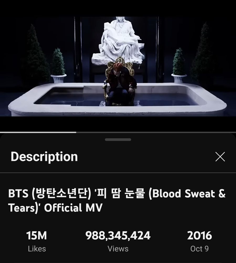 Screenshot of Blood Sweat and Tears music video from Youtube showing 988,345,424 views