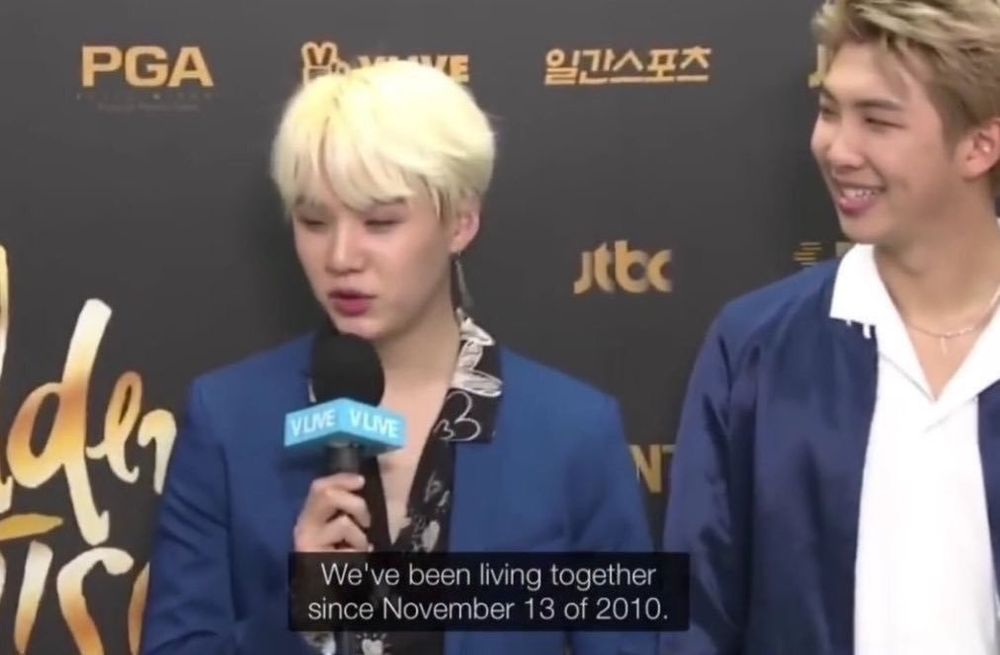 Yoongi and Namjoon.
Yoongi is saying "We've been living together since November 13 of 2010."