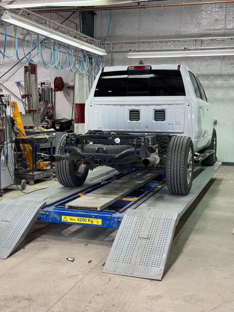 a white ram 1500 truck without a bed