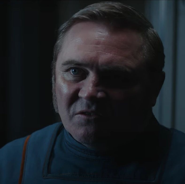 Alex Ferns  in the role of Linus Mosk in the first season of Andor. He's an enthusiastic violent instrument of the empire against undesirables.