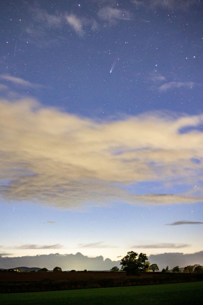 The view to the WNW at 1941. Comet C/2025 A6 Lemmon with its beautiful tail above the cloud. It was discovered by the Mount Lemmon Survey in images obtained on 3rd Jan 2025