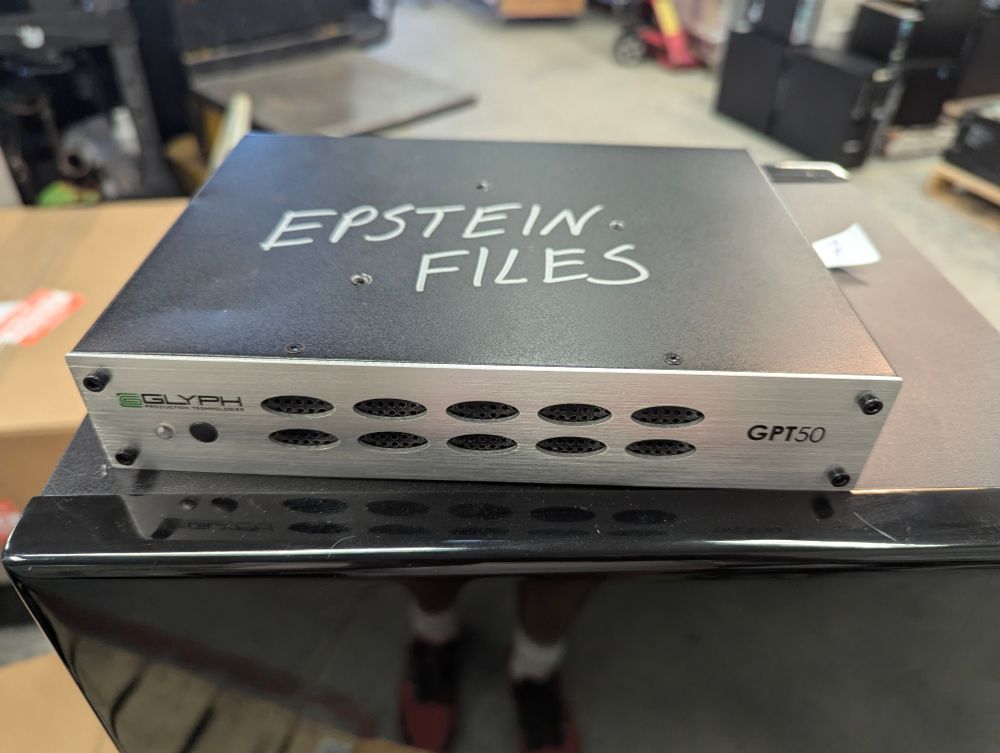 A hard drive with "EPSTEIN FILES" written—in
silver marker—on top.