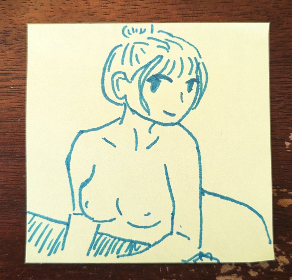 marker sketch on a sticky note. of a woman leaning over and smiling. her hair is up in a bun. it's a tasteful nude