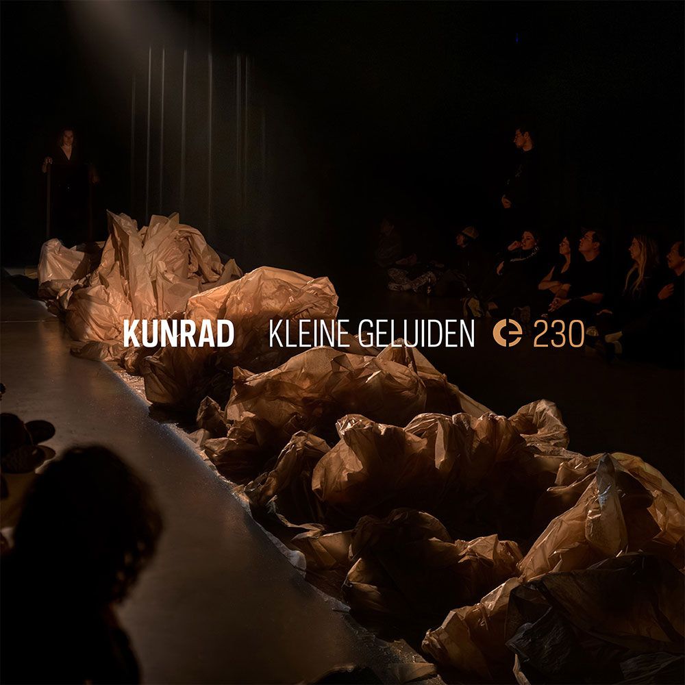Cover of Kunrad's album, featuring a photo of one of his performances with paper