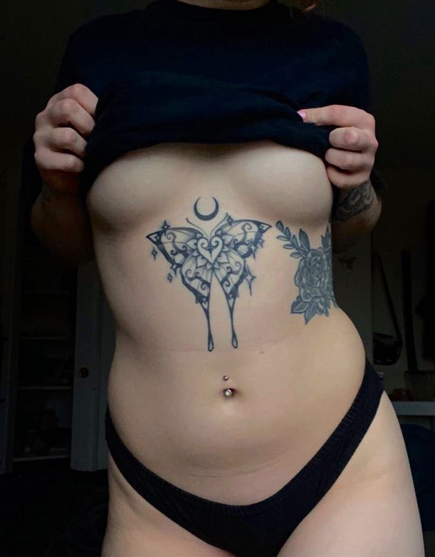 nsfw, photo cropped from my chest to right below my hips, i’m pulling my shirt up to show off my underboob and tummy tattoo