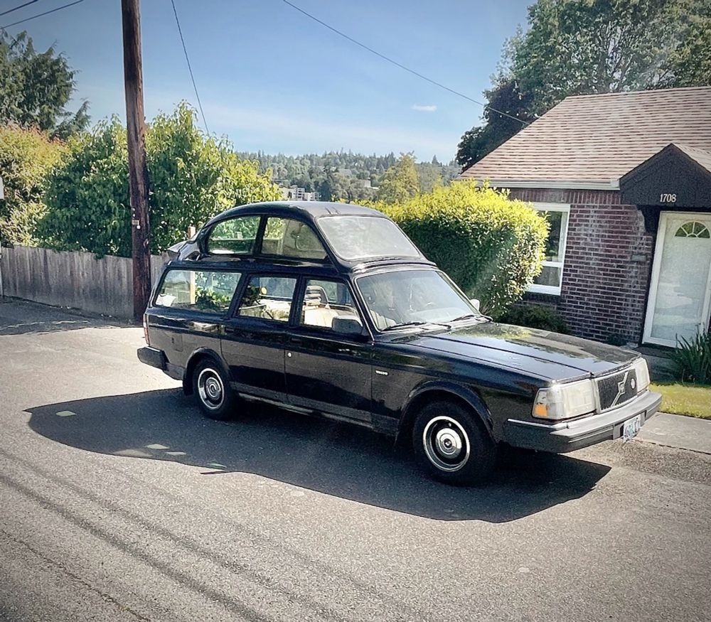 A Saab with a Volkswagen top welded to the roof