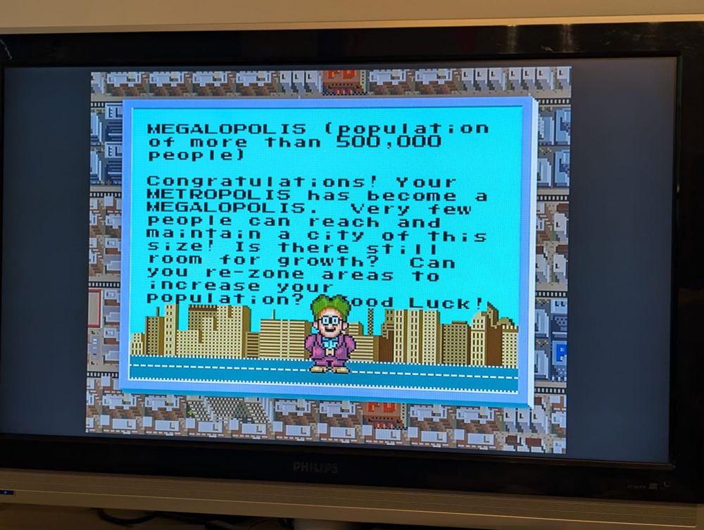 Dans le jeu SimCity le Dr Wright vous félicite quand vous atteignez plus de 500 000 habitants